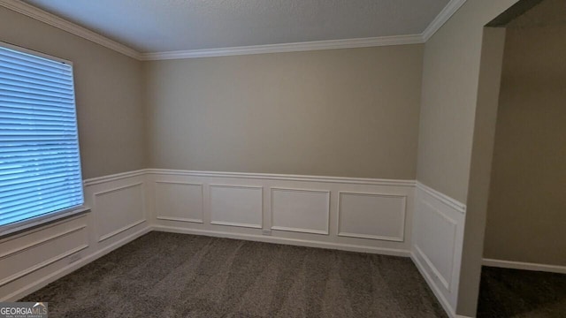 705 Mustang Ct, Hampton, GA 30228 - empty room featuring dark colored carpet, ornamental molding, a wainscoted wall, and a decorative wall