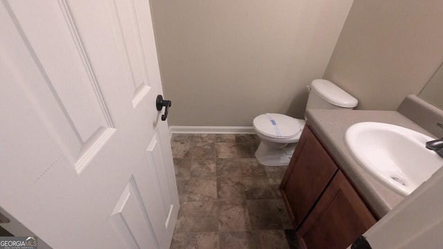705 Mustang Ct, Hampton, GA 30228 - bathroom with vanity and stone finish flooring