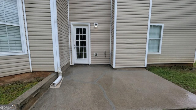 705 Mustang Ct, Hampton, GA 30228 - property entrance featuring a patio