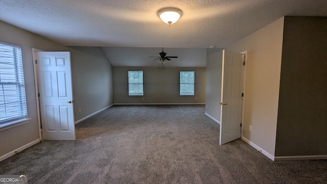 705 Mustang Ct, Hampton, GA 30228 - unfurnished room featuring a textured ceiling, ceiling fan, carpet floors, and healthy amount of natural light