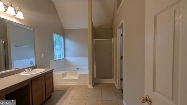 705 Mustang Ct, Hampton, GA 30228 - full bathroom with a stall shower, tile patterned floors, a garden tub, vanity, and lofted ceiling