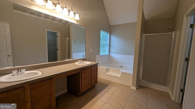 705 Mustang Ct, Hampton, GA 30228 - bathroom with a shower stall, a garden tub, tile patterned floors, lofted ceiling, and double vanity