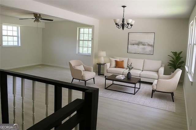 13 Travis, Rossville, GA 30741 - living area with wood finished floors, a chandelier, and a ceiling fan