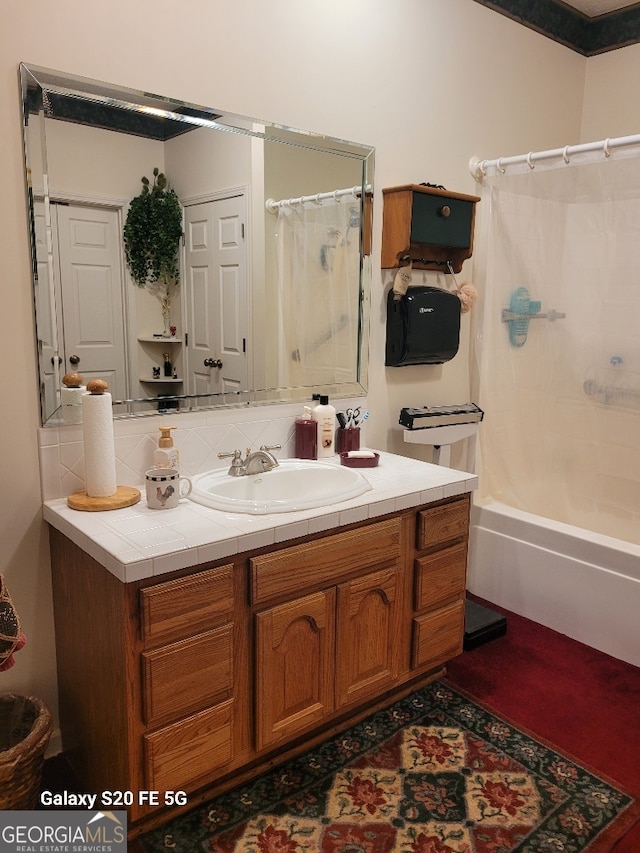 1904 S State Line Rd, Lagrange, GA 30240 - full bathroom with vanity, shower / tub combo, and decorative backsplash