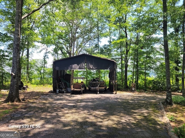 1904 S State Line Rd, Lagrange, GA 30240 - view of yard with dirt driveway and a carport