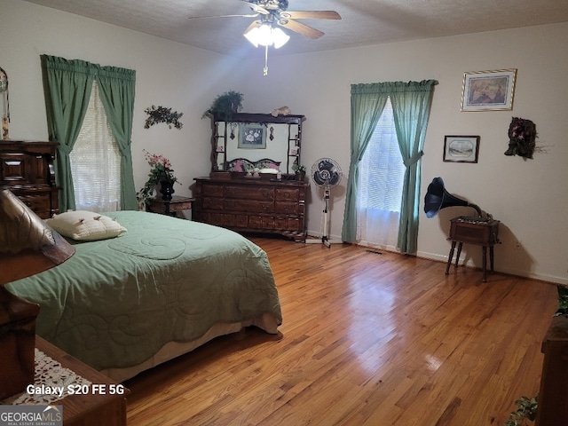 1904 S State Line Rd, Lagrange, GA 30240 - bedroom featuring light wood finished floors and ceiling fan