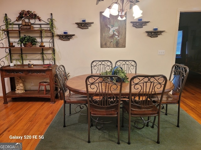 1904 S State Line Rd, Lagrange, GA 30240 - dining room with a chandelier and wood finished floors