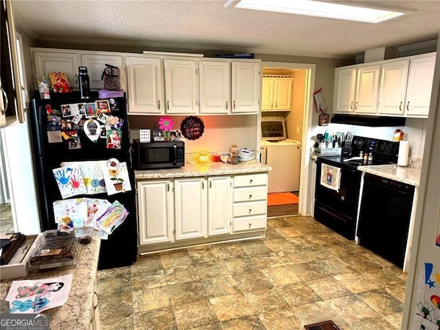 1570 Dean Mountain Rd, Cleveland, GA 30528 - kitchen with black appliances, under cabinet range hood, white cabinets, ornamental molding, and stone finish floors