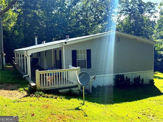 1570 Dean Mountain Rd, Cleveland, GA 30528 - back of house with a yard