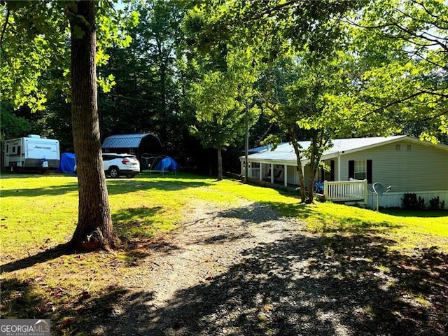 1570 Dean Mountain Rd, Cleveland, GA 30528 - view of grassy yard featuring covered porch