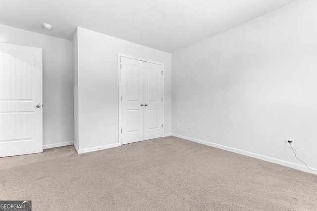 155 Shetland Pines Dr, Macon, GA 31216 - unfurnished bedroom with carpet flooring and a closet