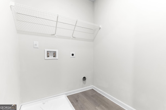 155 Shetland Pines Dr, Macon, GA 31216 - laundry room featuring hookup for an electric dryer, wood finished floors, and hookup for a washing machine