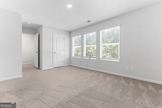 155 Shetland Pines Dr, Macon, GA 31216 - unfurnished bedroom featuring light colored carpet