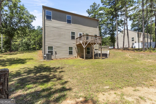 155 Shetland Pines Dr, Macon, GA 31216 - back of property featuring a wooden deck and a lawn