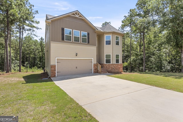 155 Shetland Pines Dr, Macon, GA 31216 - view of front of house featuring a garage, brick siding, driveway, and a front lawn