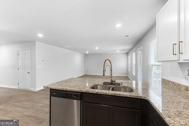 155 Shetland Pines Dr, Macon, GA 31216 - kitchen featuring dishwasher, light stone counters, a peninsula, white cabinetry, and recessed lighting