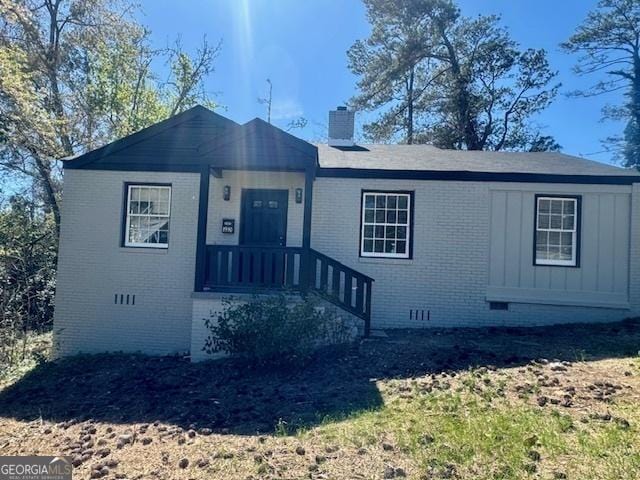 1930 Northbrook Ave, Macon, GA 31201 - view of front facade featuring brick siding, crawl space, and a chimney