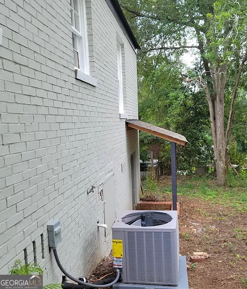 1930 Northbrook Ave, Macon, GA 31201 - exterior view of brick siding and a central AC unit