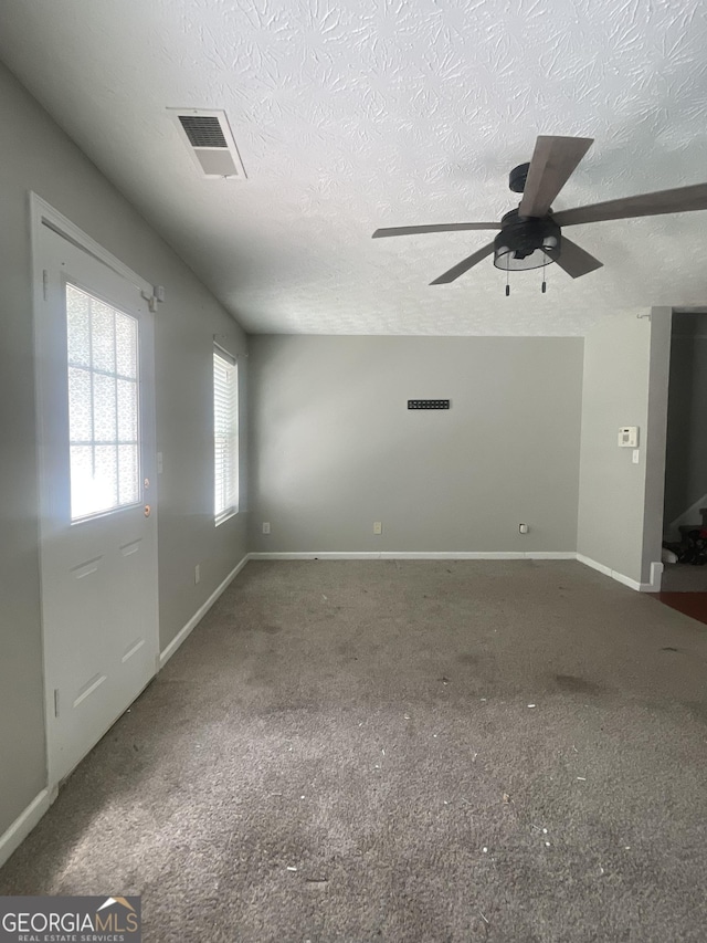 6361 Redan Sq, Lithonia, GA 30058 - unfurnished room with a textured ceiling, ceiling fan, and carpet