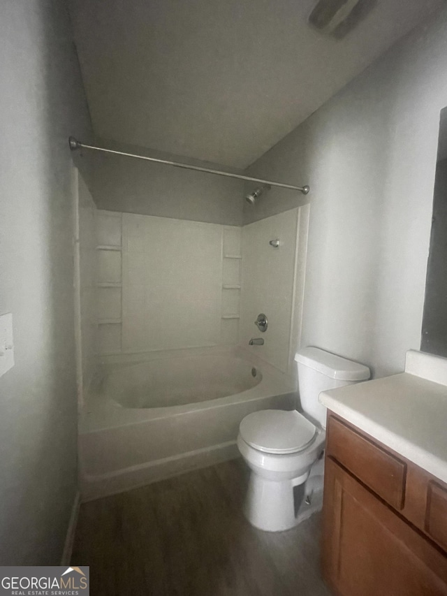 6361 Redan Sq, Lithonia, GA 30058 - full bath featuring vanity, bathing tub / shower combination, and wood finished floors