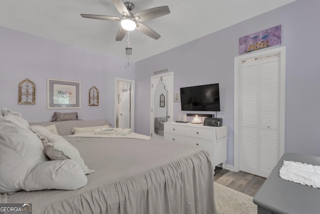 259 Coweta St, Senoia, GA 30276 - bedroom with wood finished floors, a ceiling fan, and a closet