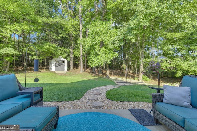259 Coweta St, Senoia, GA 30276 - view of green lawn with outdoor lounge area, a shed, and view of scattered trees