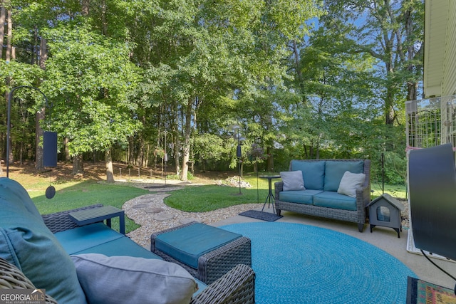 259 Coweta St, Senoia, GA 30276 - view of patio / terrace featuring an outdoor hangout area and view of wooded area