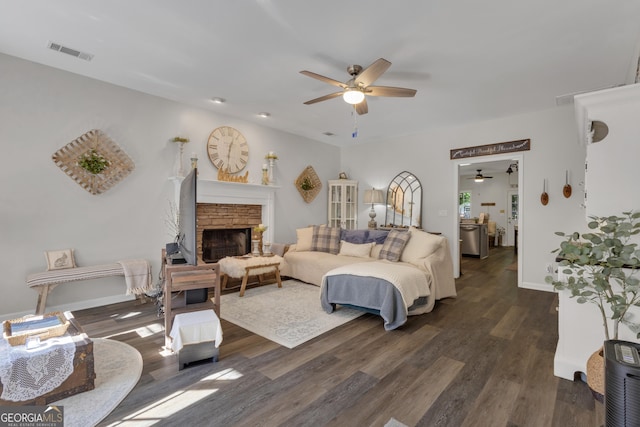 259 Coweta St, Senoia, GA 30276 - living area with ceiling fan, dark wood-type flooring, and a fireplace