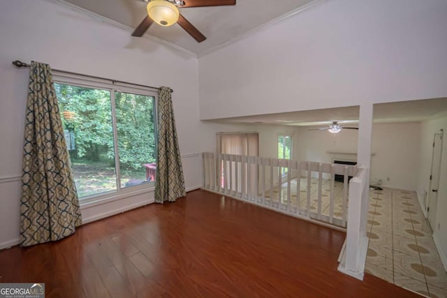 7472 Woods Ct, Lithonia, GA 30058 - unfurnished room featuring ceiling fan, wood finished floors, and crown molding