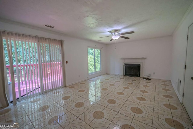 7472 Woods Ct, Lithonia, GA 30058 - unfurnished living room with a ceiling fan, a fireplace, and tile patterned flooring