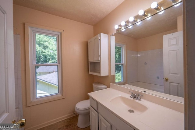 7472 Woods Ct, Lithonia, GA 30058 - full bathroom with vanity, a textured ceiling, and a shower