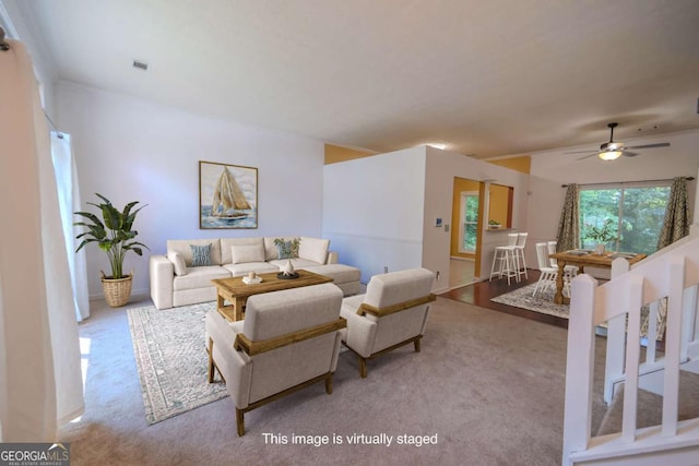 7472 Woods Ct, Lithonia, GA 30058 - living area with carpet and ceiling fan