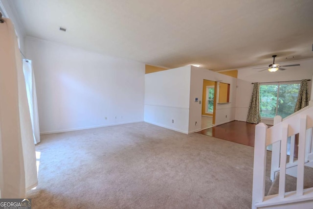 7472 Woods Ct, Lithonia, GA 30058 - carpeted spare room with ceiling fan and baseboards