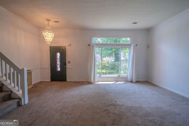 7472 Woods Ct, Lithonia, GA 30058 - carpeted foyer featuring a chandelier and stairway