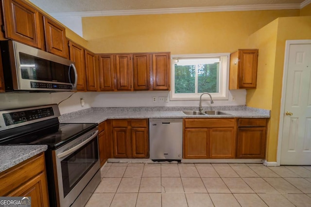 7472 Woods Ct, Lithonia, GA 30058 - kitchen featuring appliances with stainless steel finishes, crown molding, brown cabinetry, and light tile patterned floors