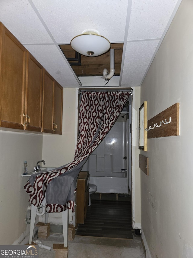 1448 SE Hillside Pl, Conyers, GA 30094 - staircase featuring concrete floors