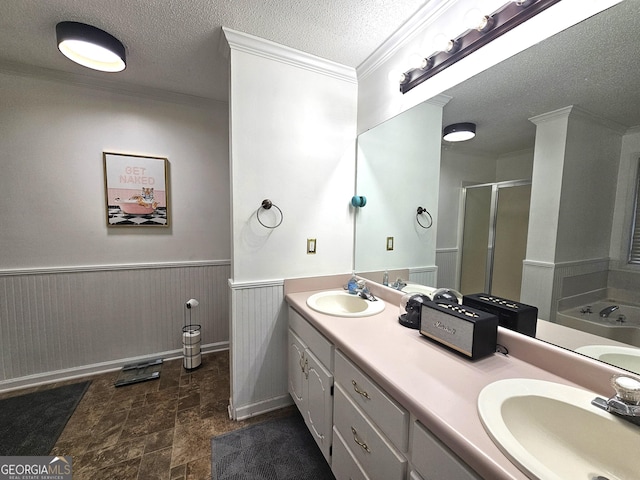 164 Turner Creek Dr, Hampton, GA 30228 - full bath featuring a stall shower, double vanity, a bath, stone finish flooring, and wainscoting