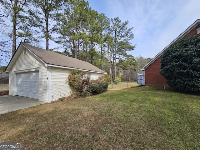 164 Turner Creek Dr, Hampton, GA 30228 - view of green lawn with a garage and an outdoor structure