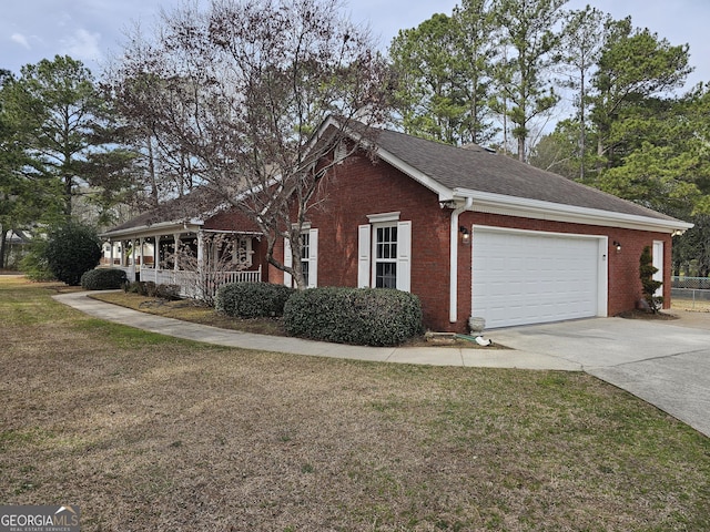 164 Turner Creek Dr, Hampton, GA 30228 - view of side of property with driveway, brick siding, a garage, and a yard