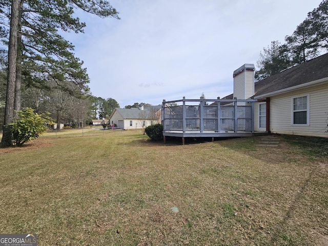 164 Turner Creek Dr, Hampton, GA 30228 - view of grassy yard with a wooden deck