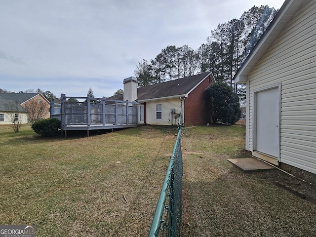 164 Turner Creek Dr, Hampton, GA 30228 - view of grassy yard with a deck