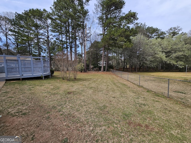 164 Turner Creek Dr, Hampton, GA 30228 - view of yard with a deck and view of wooded area