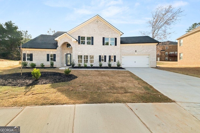 4647 Lantern Ct, Lithonia, GA 30038 - view of front facade with concrete driveway, a garage, a front lawn, and brick siding