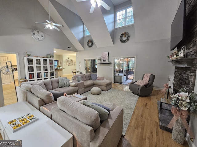 200 Chaparral Trce, Tyrone, GA 30290 - living room featuring ceiling fan, high vaulted ceiling, a fireplace, and wood finished floors