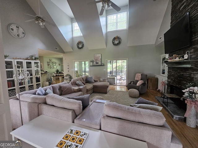 200 Chaparral Trce, Tyrone, GA 30290 - living area featuring ceiling fan, wood finished floors, high vaulted ceiling, and a fireplace