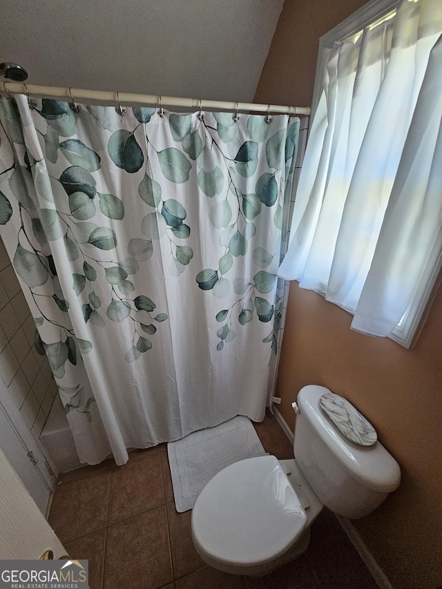 200 Chaparral Trce, Tyrone, GA 30290 - bathroom with curtained shower and tile patterned floors