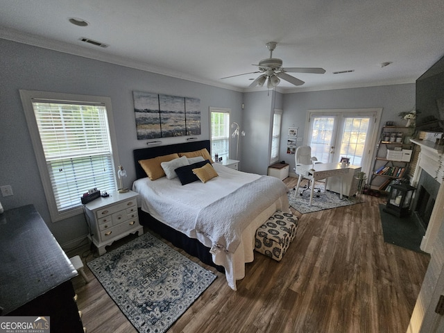 200 Chaparral Trce, Tyrone, GA 30290 - bedroom featuring wood finished floors, crown molding, a ceiling fan, and a fireplace with flush hearth