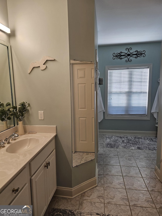 200 Chaparral Trce, Tyrone, GA 30290 - bathroom featuring vanity and marble finish floors