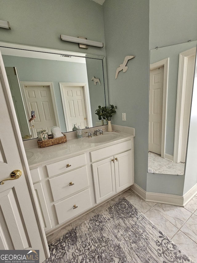 200 Chaparral Trce, Tyrone, GA 30290 - bathroom featuring marble finish flooring and vanity