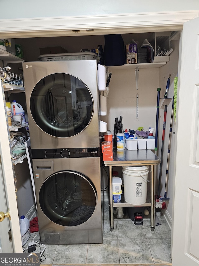 200 Chaparral Trce, Tyrone, GA 30290 - laundry room featuring stacked washer / drying machine and tile patterned flooring